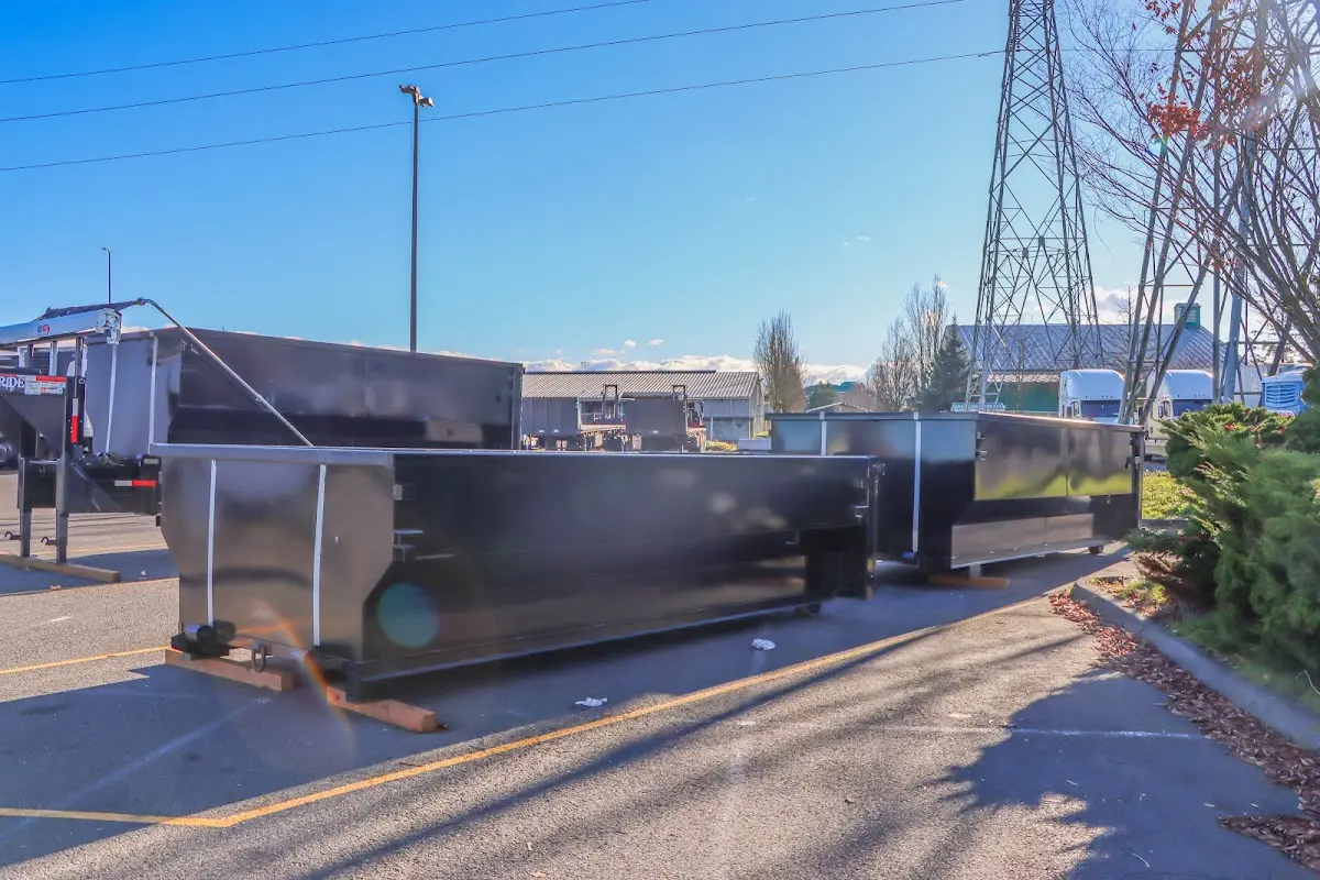 Roll-off dumpster ready for waste disposal at job site for Demolition Dumpster Rental in Geddes